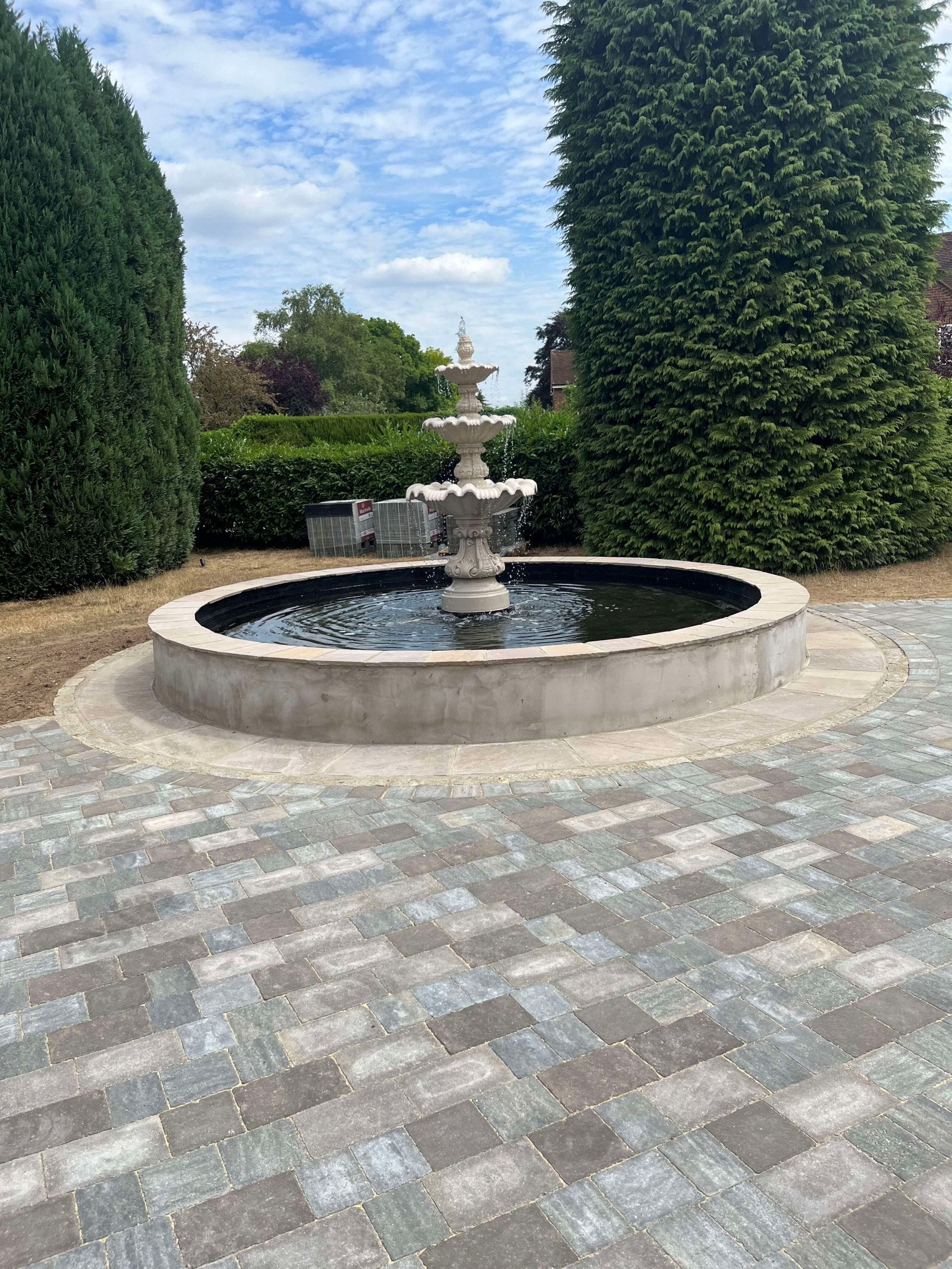 Marshalls Tegula Blockpaving complimented with the circular water feature