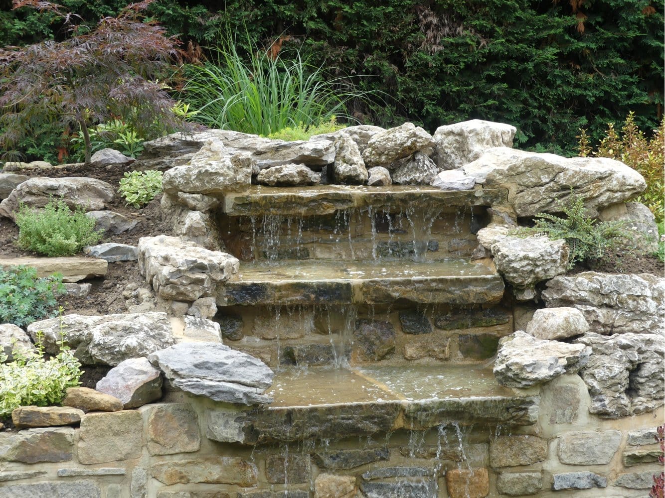 From Pool to a Waterfall Garden