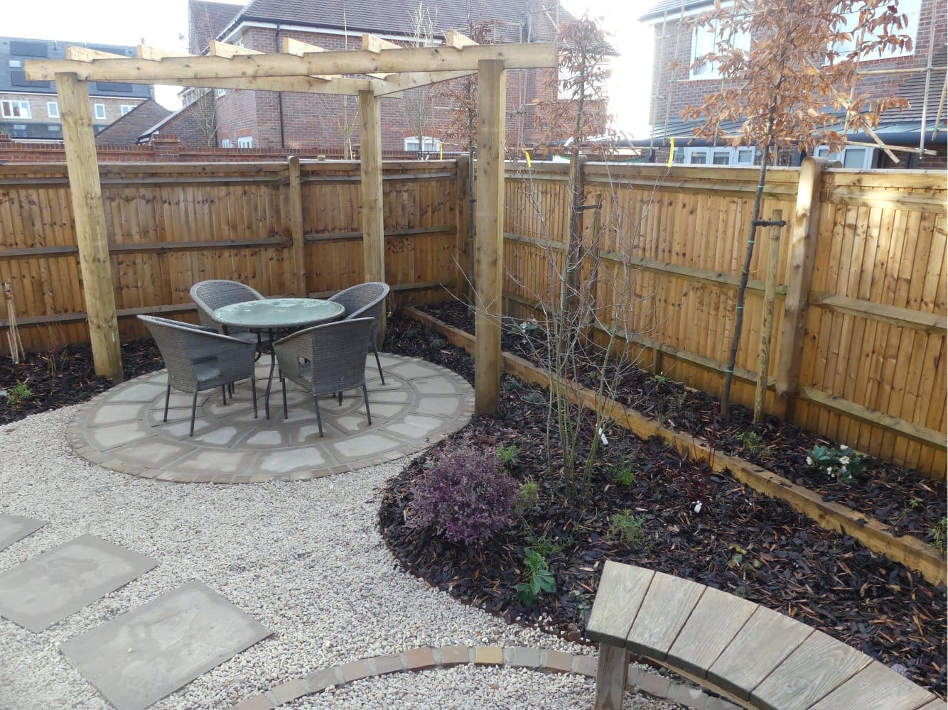 Curved Bench, Pergola and a place for a sculpture