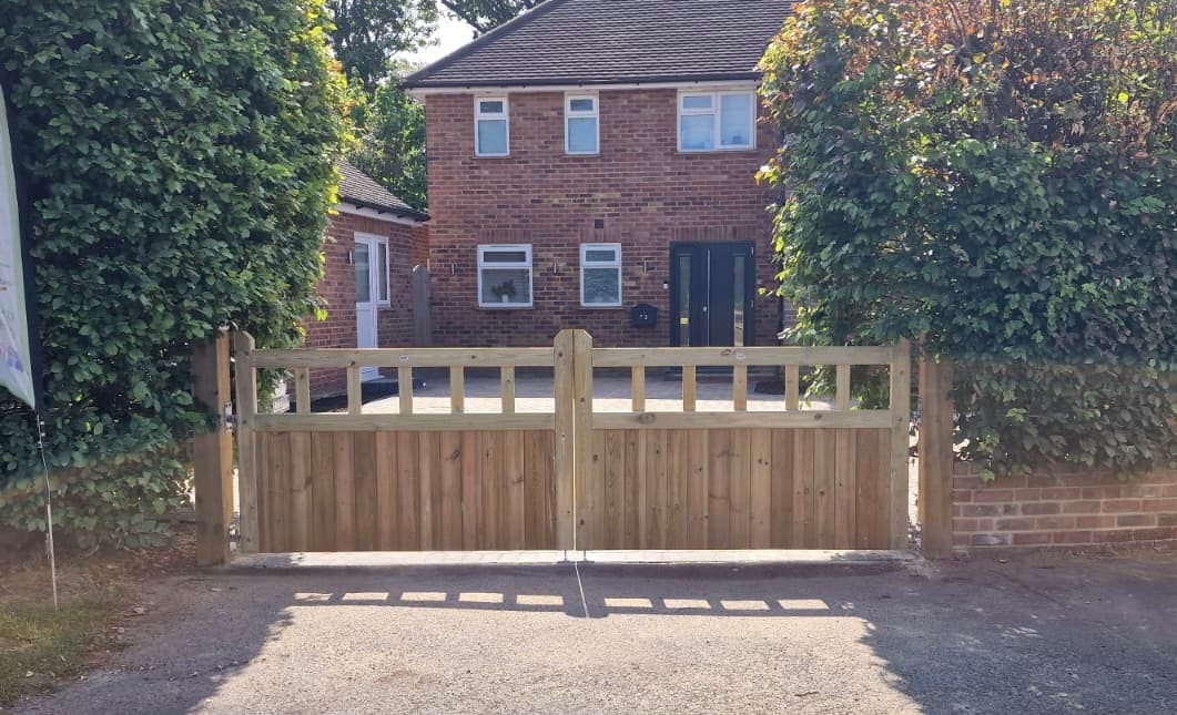 Block Paved Driveway and Wooden Gates